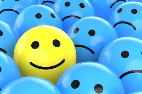 Happy Face Among Sad Faces 0